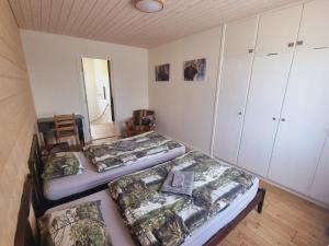 Postel nebo postele na pokoji v ubytování Elch Zimmer Wilderness Life