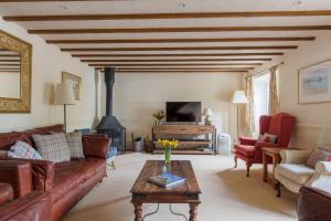 Μια τηλεόραση ή/και κέντρο ψυχαγωγίας στο Kingfisher Cottage