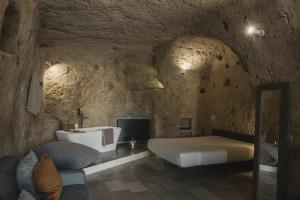 Posteľ alebo postele v izbe v ubytovaní Aque cave