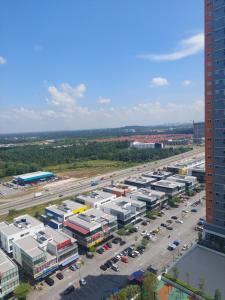 an aerial view of a parking lot in a city at KLIA Travel Homestay - 3R 2B - WIFI & NETFLIX in Sepang