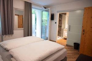 Postel nebo postele na pokoji v ubytování Bed & Breakfast Goldener Stiefel