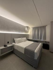 Llit o llits en una habitació de 232 Concept Hotel
