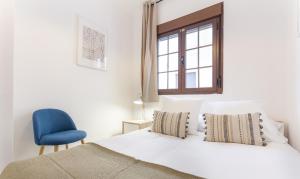 Postel nebo postele na pokoji v ubytování Apartamento Retiro III en Madrid