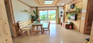 Posezení v ubytování Tree House Guesthouse