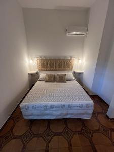 Postel nebo postele na pokoji v ubytování B&B Via dei mille