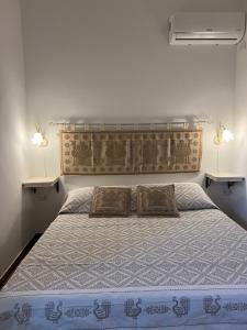 Postel nebo postele na pokoji v ubytování B&B Via dei mille