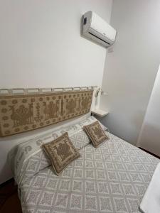 Postel nebo postele na pokoji v ubytování B&B Via dei mille