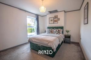 a bedroom with a bed and a window at Bright and Warm Home in Lincoln by Renzo, Free Wi-Fi, Perfect for Staycations! in Lincolnshire