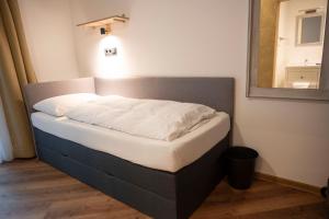 Postel nebo postele na pokoji v ubytování Bed & Breakfast Goldener Stiefel
