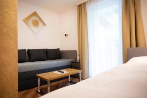 Postel nebo postele na pokoji v ubytování Bed & Breakfast Goldener Stiefel
