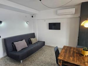 Et tv og/eller underholdning på Apartamento reformado vista mar