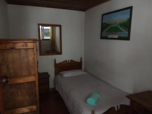 Postel nebo postele na pokoji v ubytování Casa Larimar