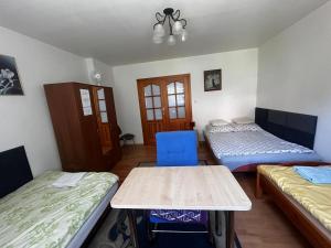 Postel nebo postele na pokoji v ubytování Pokoje u Danki