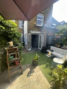 Taman di luar My Sky London House Near Attractions