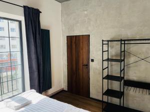 Katil atau katil-katil dalam bilik di Loft Cejl 7 Apartments