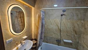 A bathroom at Alex sea view apartment - families only