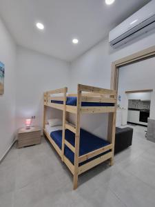 Postel nebo postele na pokoji v ubytování Torremare