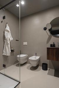 Kúpeľňa v ubytovaní REGO APARTMENTS - Boutique Aparthotel & Serenity Spa with some off-site apartments in the Heart of Bergamo City Center