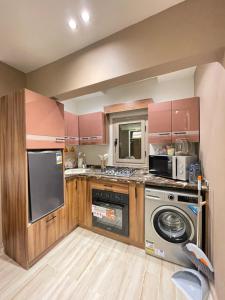 Kuchyň nebo kuchyňský kout v ubytování Luxury Studio House 1200-4