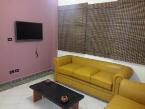 En tv och/eller ett underhållningssystem på Logaina Sharm Resort