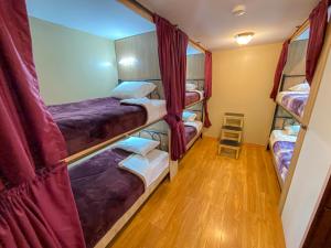Postel nebo postele na pokoji v ubytování Golden Rest Latacunga + 37 fotografií
