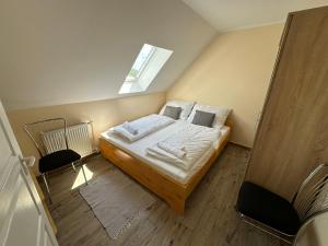 Posteľ alebo postele v izbe v ubytovaní Siófok apartman