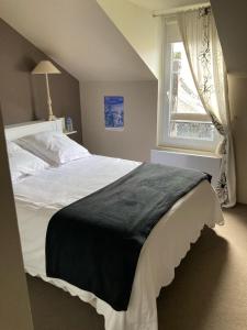 Posteľ alebo postele v izbe v ubytovaní Duplex Vannes centre