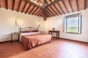 Postel nebo postele na pokoji v ubytování Agriturismo Aiole