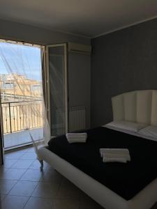 Una cama o camas en una habitación de Fun House