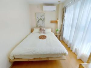 41池袋最中心 两室一厅 池袋站10分 2 rooms Ikebukuro center 10 mins to ST Max 5P 直达新宿 涉谷 表参道 池袋 上野 代代木 银座 原宿にあるベッド
