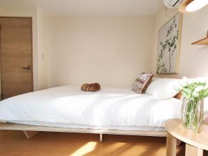 41池袋最中心 两室一厅 池袋站10分 2 rooms Ikebukuro center 10 mins to ST Max 5P 直达新宿 涉谷 表参道 池袋 上野 代代木 银座 原宿にあるベッド