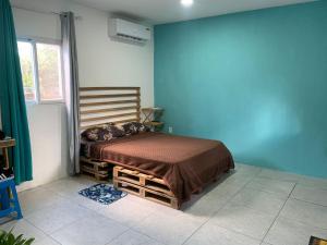 Postel nebo postele na pokoji v ubytování Relaxing Vibes Curaçao