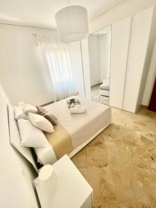 Letto o letti in una camera di Home Sisters