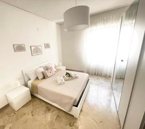Letto o letti in una camera di Home Sisters