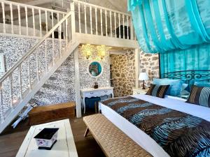 מיטה או מיטות בחדר ב-PortaDelMare deluxe suites