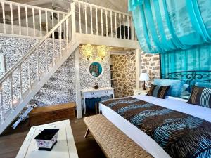 Postel nebo postele na pokoji v ubytování PortaDelMare deluxe suites
