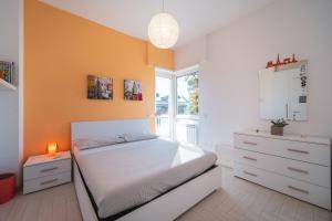 Postel nebo postele na pokoji v ubytování Villa Silvia Fregene