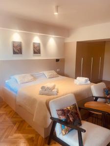 Posteľ alebo postele v izbe v ubytovaní Apartments Nikval