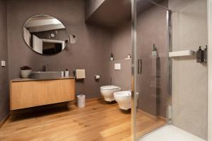 Kúpeľňa v ubytovaní REGO APARTMENTS - Boutique Aparthotel & Serenity Spa with some off-site apartments in the Heart of Bergamo City Center