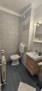 Koupelna v ubytování Hotel Carmen
