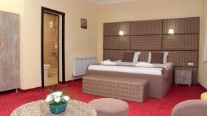 מיטה או מיטות בחדר ב-Хотел Хилез Hotel Hilez