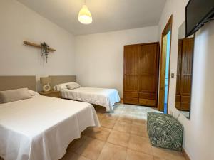 Postel nebo postele na pokoji v ubytování Apartamento LB, vistas a la ría