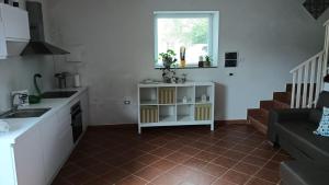 Kuchyň nebo kuchyňský kout v ubytování Casa Floris