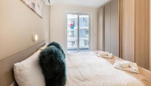 Ένα ή περισσότερα κρεβάτια σε δωμάτιο στο New 3 Bedroom apartment A1