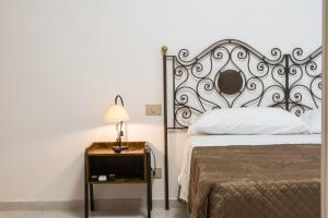 Postel nebo postele na pokoji v ubytování COLOMBO UPPER HOUSE
