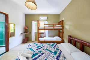 En eller flere senge i et værelse på Recanto Bem Te Vi + 82 billeder