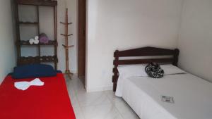Postel nebo postele na pokoji v ubytování Pousada & Camping Recanto dos Anjos Azuis