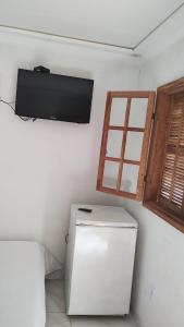 TV a/nebo společenská místnost v ubytování Pousada & Camping Recanto dos Anjos Azuis