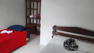 Postel nebo postele na pokoji v ubytování Pousada & Camping Recanto dos Anjos Azuis