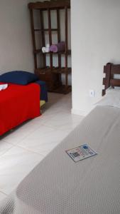 Postel nebo postele na pokoji v ubytování Pousada & Camping Recanto dos Anjos Azuis
